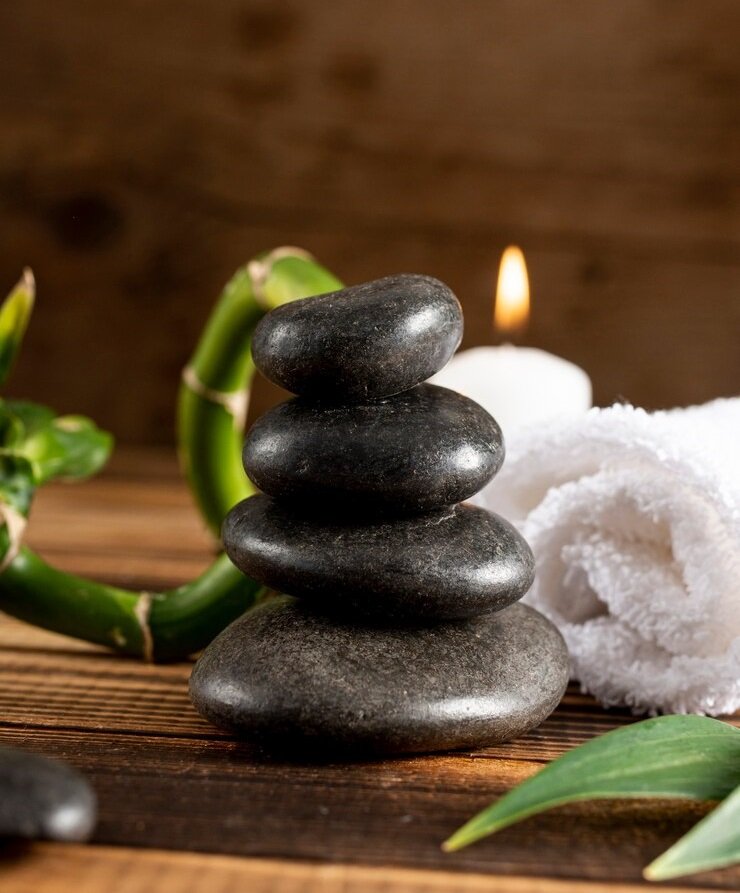arrangement-with-spa-stones-candle_23-2148290870