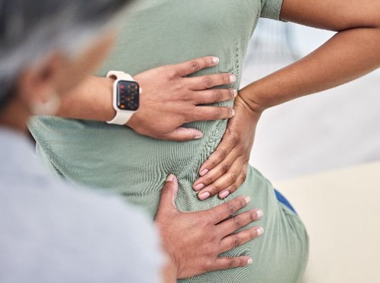 resized_back-pain-hands-in-physical-therapy-and-chiroprac-2025-04-06-08-46-55-utc