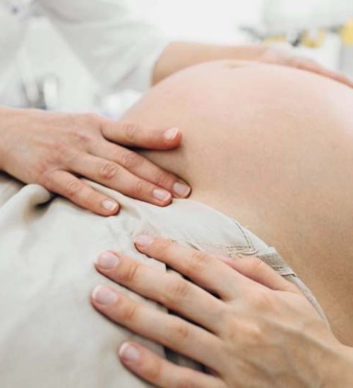 resized_female-doctor-examining-pregnant-stomach-close-up-2025-04-29-00-52-26-utc