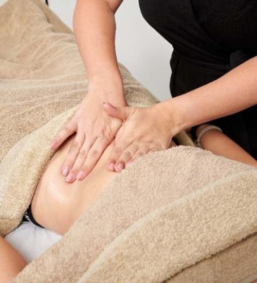 resized_professional-masseuse-massaging-her-female-client-2025-02-06-04-32-14-utc