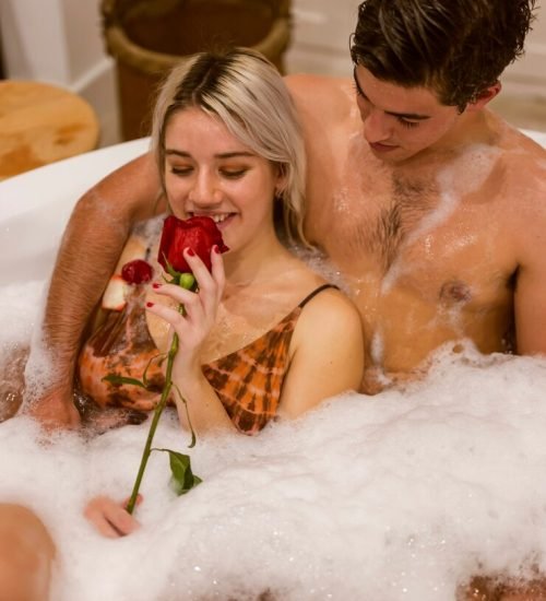 smiley-lovely-couple-taking-bath_23-2148378782